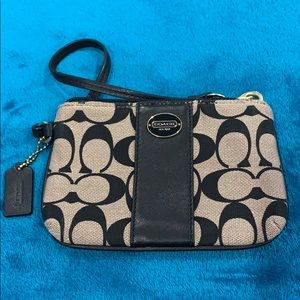 Coach tan and black wristlet